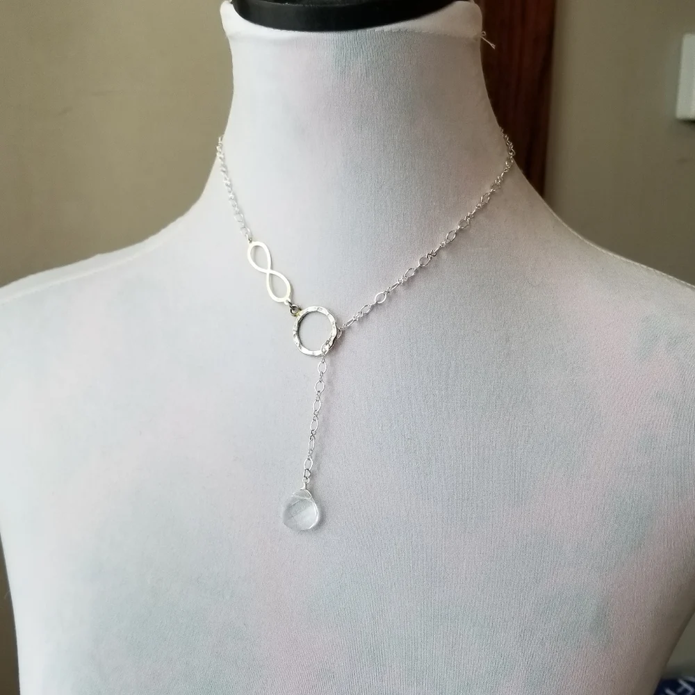 Infinity symbol necklace thread through clear briolette silver gold tone
